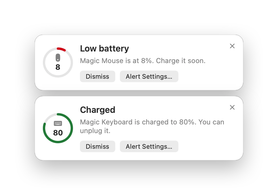 Two alert cards: Low battery, Magic Mouse is at 8%, and Charged, Magic Keyboard is charged to 80%